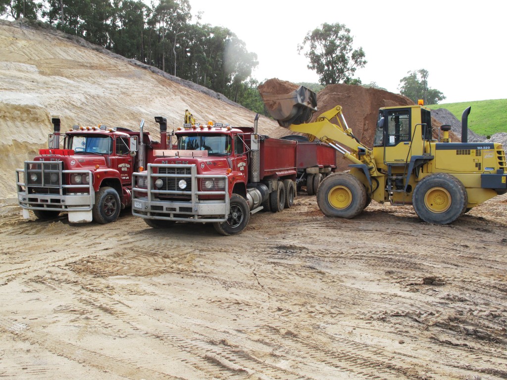 SITE PHOTO: Trucks being loaded